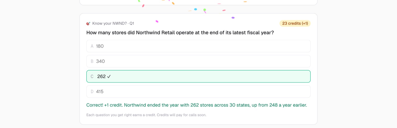 A multiple-choice question about the company, answered correctly, with confetti and a credit earned